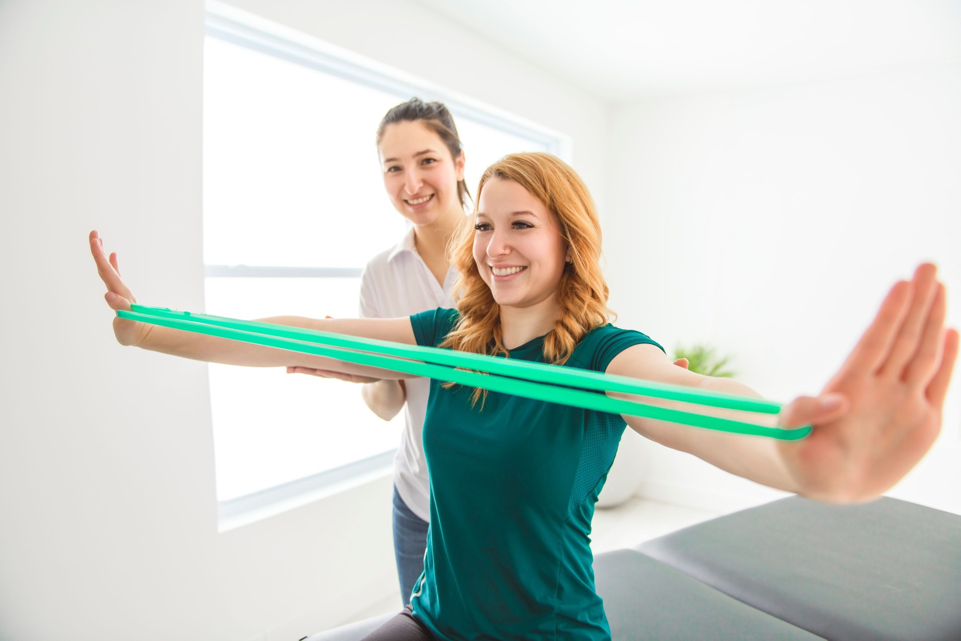 Modern rehabilitation physiotherapy at work with client